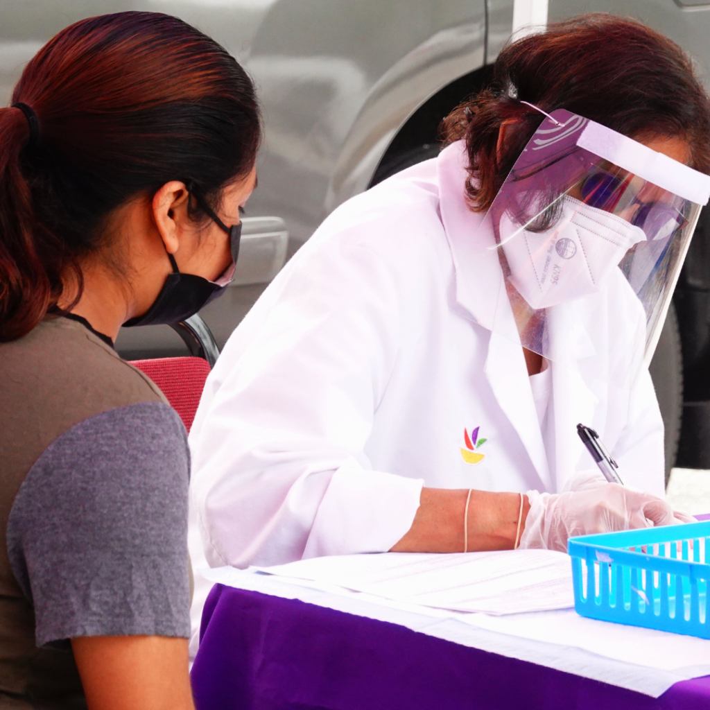 Health worker talking to a patient